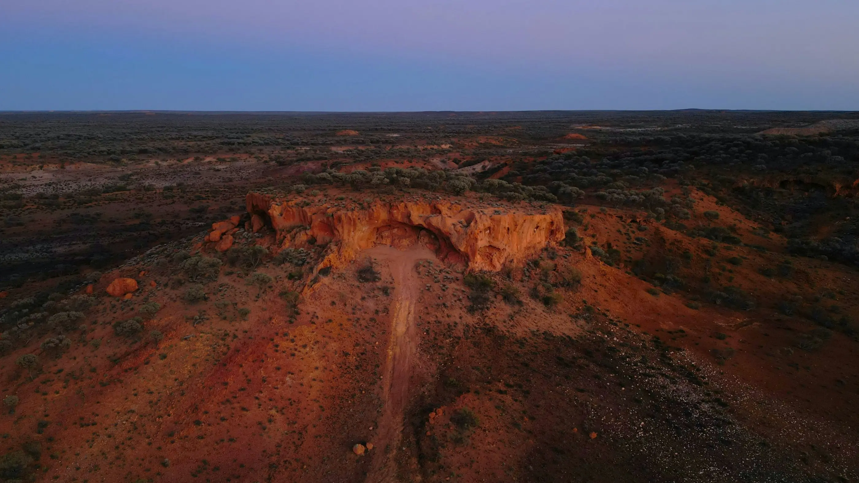 Red arid-zone gully erosion at dusk